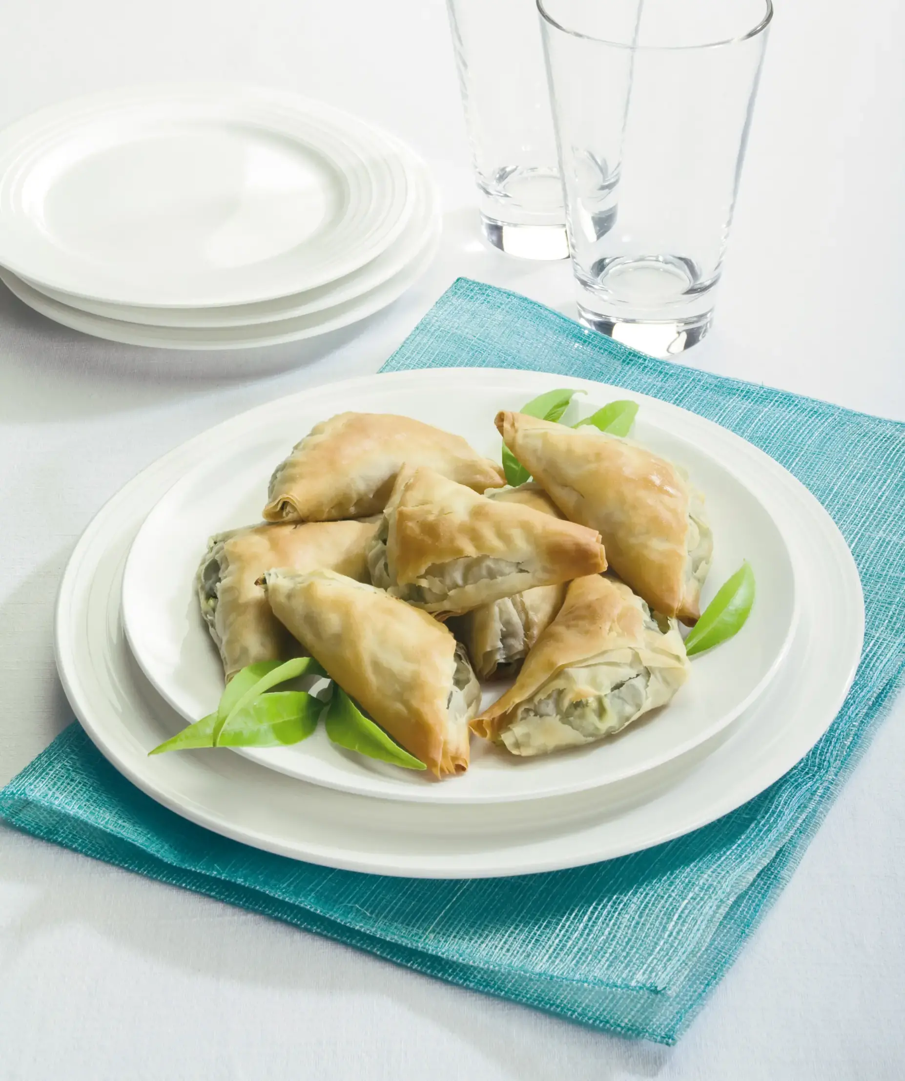 Triangoli con erbette e feta